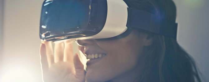 photo – a closeup of a woman wearing a VR headset